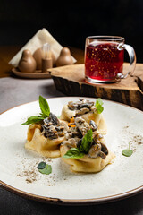 delicious pancakes with filling on a plate
