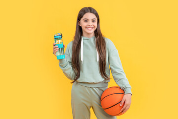 teen basketball girl on background. photo of teen basketball girl with water bottle.