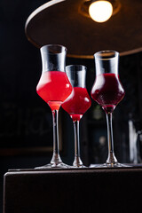 Beautiful and delicious alcoholic cocktails prepared at the bar by the bartender