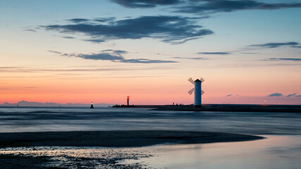 Sunset at the lighthouse in Swinoujscie, Poland.