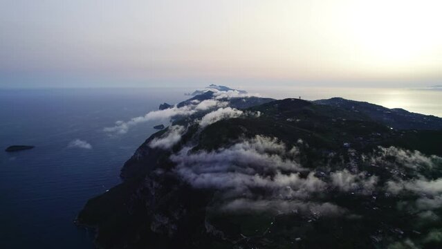 drone over clouds over amalfi and capri