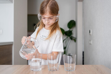 Kid making chemical experiments or tests home, improving knowledge, studying in playful manner, homeschooling concept.