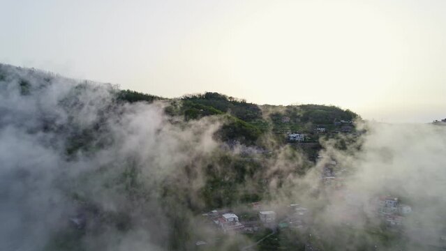 drone fly through clouds over amalfi and capri