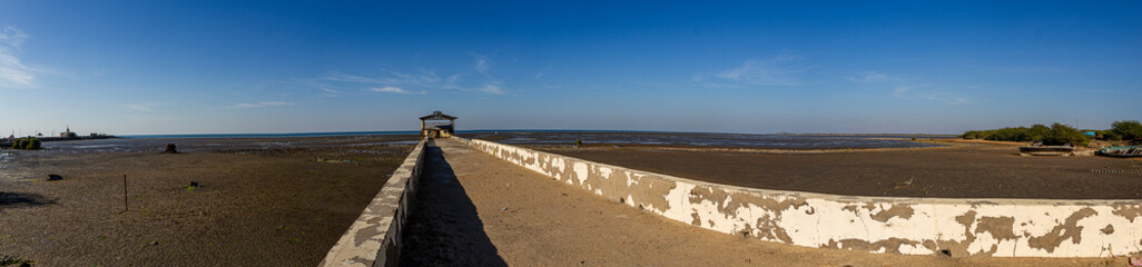 A small jetty in Koteshwar in the Kori Creek at low tide in the western most corner of India in Gujarat state	