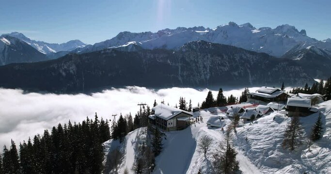 La Creusaz over the fog, lateral travelling - Les Mar&eacute;cottes, Switzerland - Aerial 4K