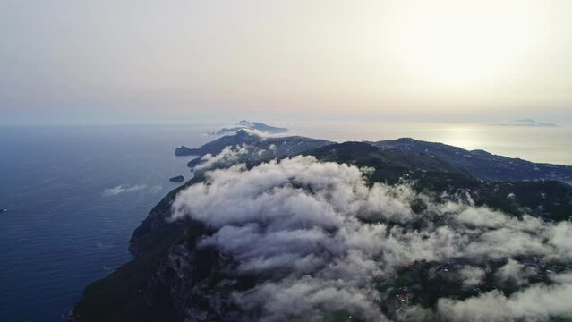 drone over clouds over amalfi and capri on hakata