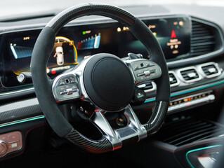 stylish sports steering wheel with alcantara in a premium fast car