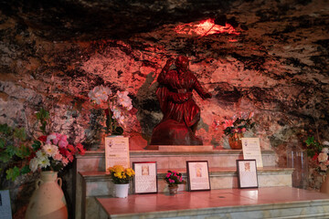 Haifa, Israel, January 10, 2023 : The altar hollowed out in the rock in the Stella Maris Monastery which is located on Mount Carmel in Haifa city in northern Israel