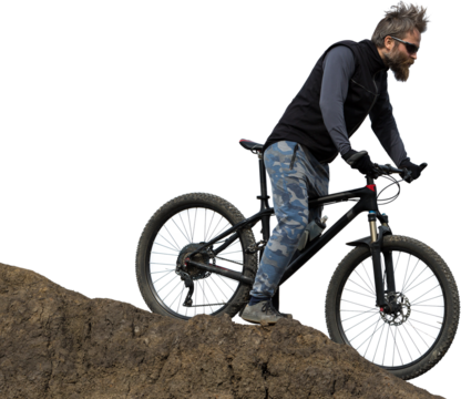 Sports brutal bearded guy on a modern mountain bike. Beautiful view from the mountain. Panoramic view for banner.