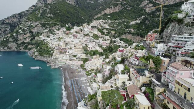 drone flies over positano amalfi