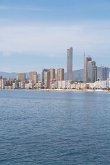 Fototapeta premium Skyline of the city of Benidorm with skyscrapers on the beachfront. Tourist town on the Costa Blanca (Alicante, Spain).