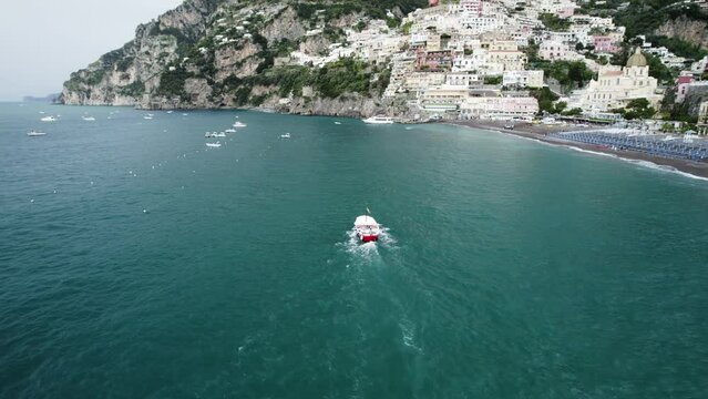 Aerial view of boat along the coast in Positano on the Amalfi Coast