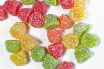 Multicolored gumdrops on a white background
