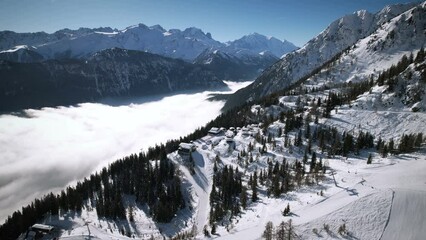 Approaching la Creusaz over the fog - Aerial 4K