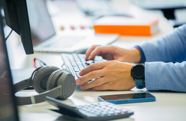male hands work on the keyboard in the office.person working in the office.business banner...
