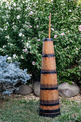 Fototapeta premium Traditional antique wooden Butter churn for hand-making butter from Thrace Northern Greece.
