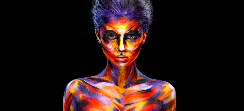 Download high quality photo for the cover of an audio CD or book. Portrait of the bright beautiful girl with art colorful make-up and bodyart