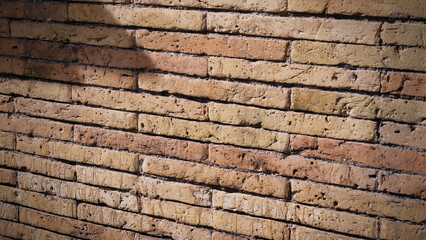 Weathered stained old brick wall