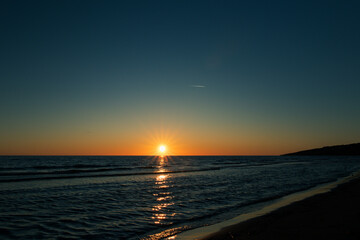 Magis sunset on the beach