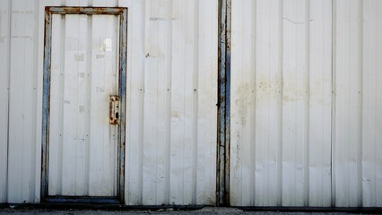 rusty industrial metal door as background