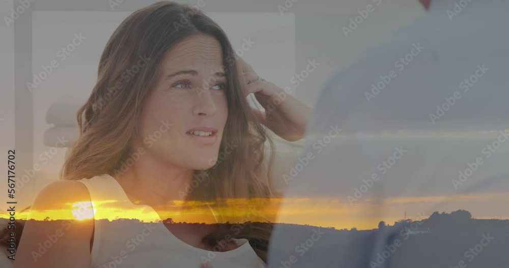 Wall mural Animation of landscape over caucasian woman consulting psychologist