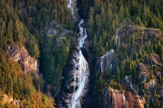 Shannon Falls in Squamish, BC, Canada. Canadian Nature Background. Sunny winter Sunset