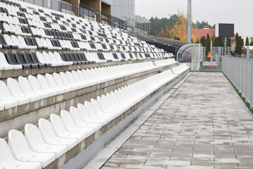 football tribune black and white chairs