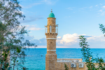The minaret of Al-Bahr Mosque or Masjid al-Bahr, meaning in all languages The Sea Mosque, in the...