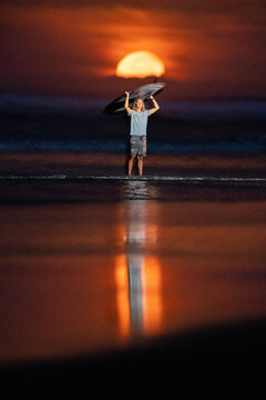 Surfing the sunrise in Costa Rica