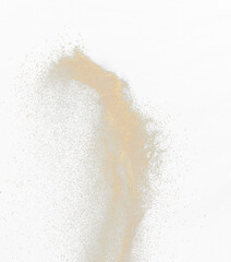 Sand flying explosion, Golden sand wave explode. Abstract sands cloud fly. Yellow colored sand splash throwing in Air. black background Isolated high speed shutter, throwing freeze stop motion