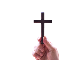 Hand holding a crucifix cross, isolated.
