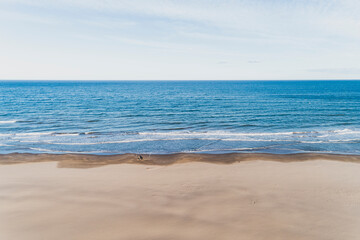 waves on the beach in the late afternoon, Valencia, Spain