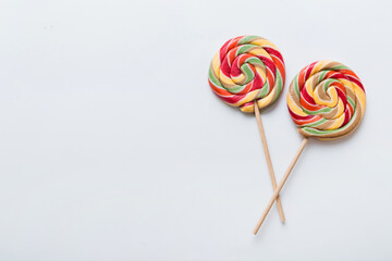 Set of colorful lollipops on colored background. Summer concept. Party Happy Birthday or Minimalist...