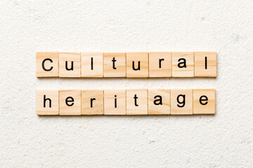 cultural heritage content word written on wood block. cultural heritage content text on table, concept