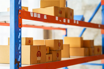 Box package on product shelf in warehouse, nobody.