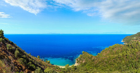 Fototapeta premium Aegean sea coast landscape and Mount Athos in mist (Chalkidiki, Greece).