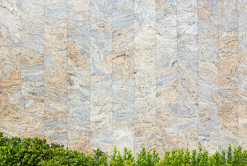 Background Image of Yellow Marble Tiles with Natural Patterns, The bottom edge has green plants to feel relaxed.