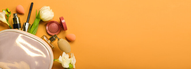 Romantic composition with bag, decorative cosmetics and flowers on orange background with space for text