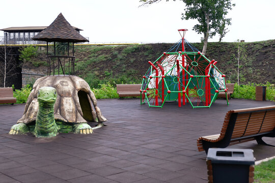 View of children's playground with climbing dome