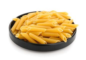 Plate of raw penne pasta on white background