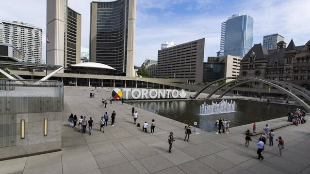Hyperlapse of people at popular tourist spot in Nathan Philips Square in Toronto