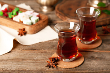 Cups of Turkish tea on wooden background