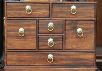 Close-up of wooden furniture and handle