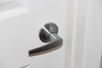 A closeup isolated photo of a simple door handle