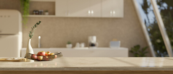 Copy space on kitchen tabletop over blurred background of modern contemporary bright kitchen