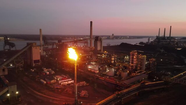 Flare at Zug Island, steel mill, Detroit Michigan, aerial view at night