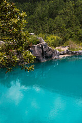 Fototapeta na wymiar Nature scenes clearly turquoise blue lake of Blue Moon Lake at Blue Moon Valley at lijiang Yunnan province China