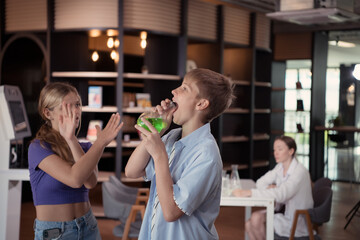 Portrait of students in science classroom play with each other and have fun before attend class.