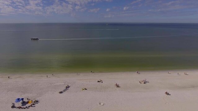 4K Drone Video of Beach Cabanas and Umbrellas at Bellwether Resort on the Gulf of Mexico in St. Pete Beach, Florida