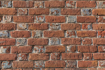Reddish brown brick wall abstract background found in Colonial Williamsburg - 567240385